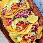 prepared Fluke fish tacos with cabbage, avocado and lime
