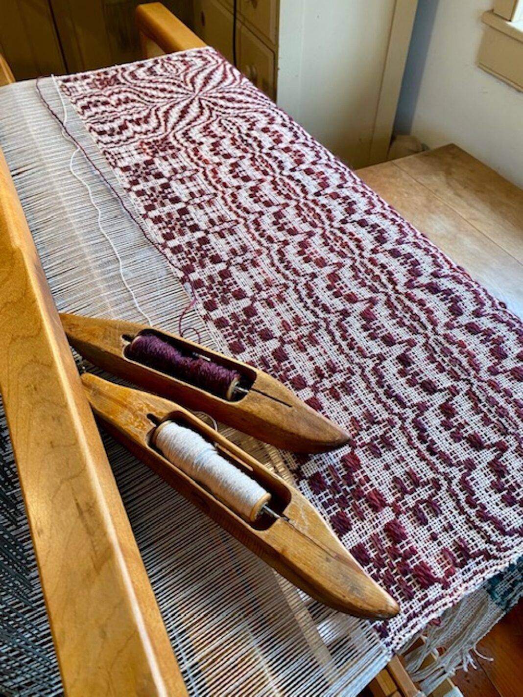 wool and cotton coverlet on the loom